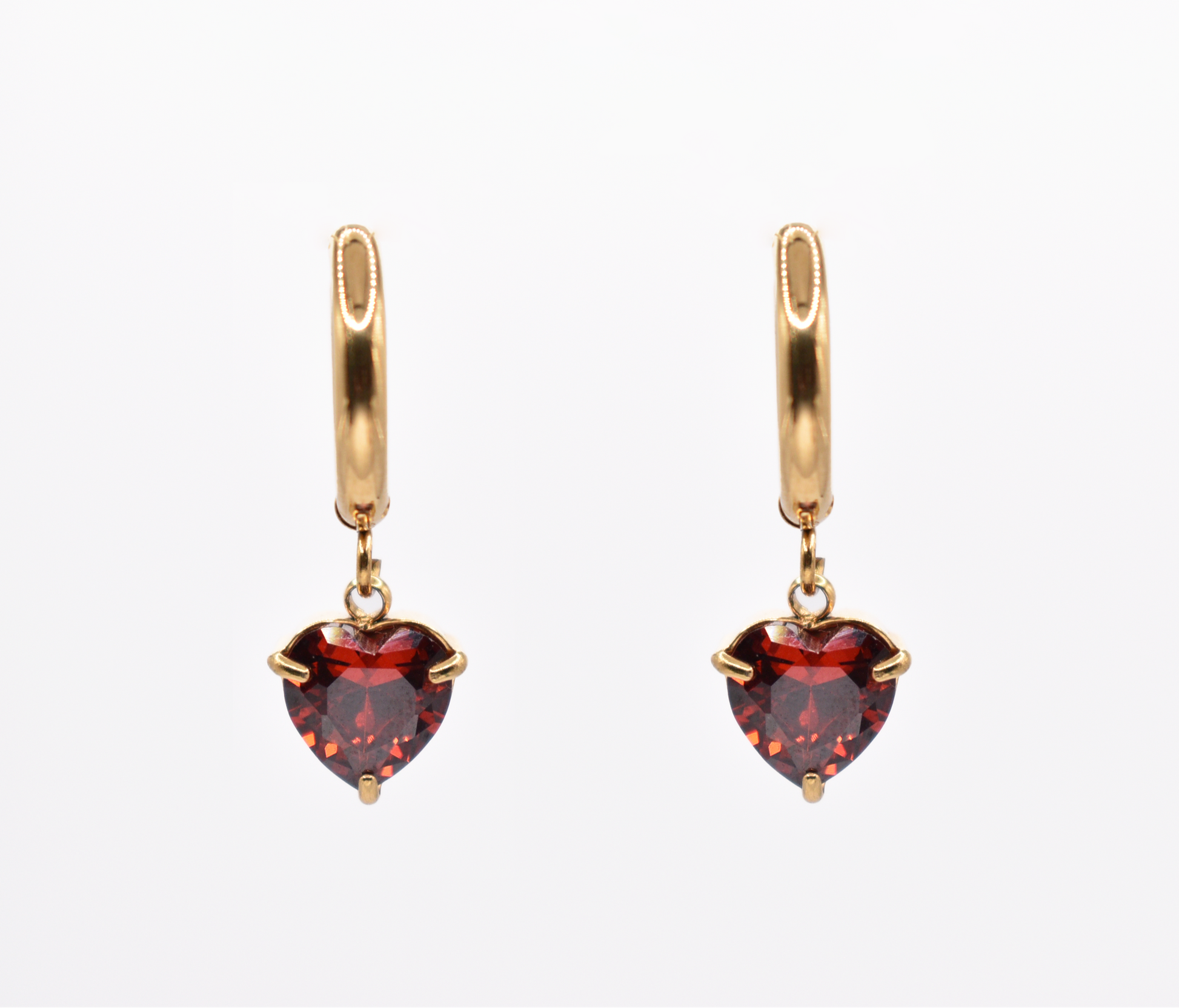 Red heart dangle hoop earrings with 18k gold plating on white background

