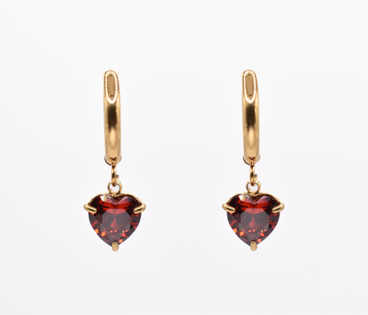 Red heart dangle hoop earrings with 18k gold plating on white background

