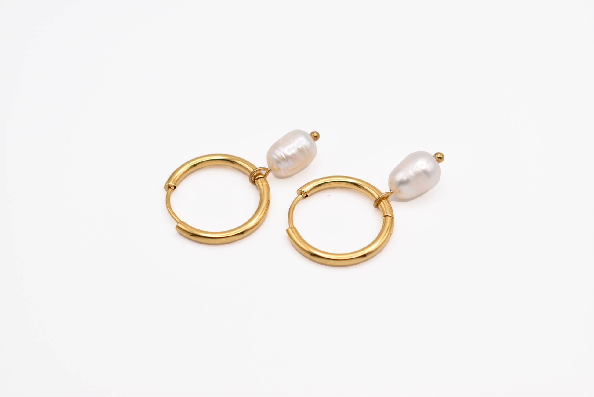 18k gold plated pearl hoop earrings on white background